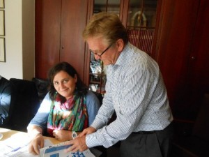 Snapshot from the session: Hans Jørgen Lorenzen (right) admires a publication from Murcia; left: Consuelo Garcia.